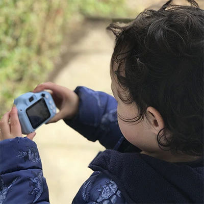 child playing with Keilini camera